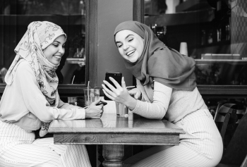 Islamic friends talking and looking on the sm.. | Free stock photo - 400053 Islamic friends talking and looking on the sm.. | Free stock photo - 400053