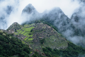 It was an amazing view at Machu Pichu in Peru with the clouds hiding part of the mountains.