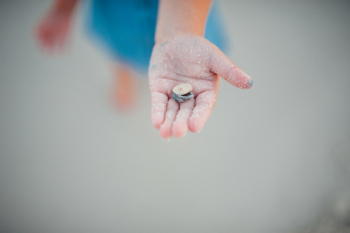 Kid Holding Shell Kid Holding Shell