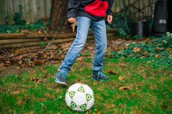 Kid Plays Soccer Kid Plays Soccer