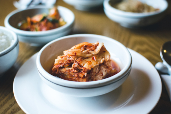 Kimchi in a white bowl close up Kimchi in a white bowl close up
