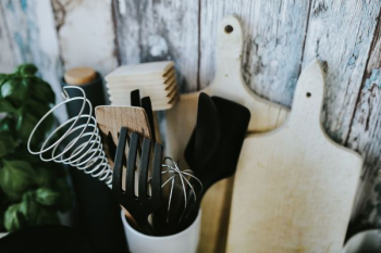 Kitchen utensils and cans by the wall Kitchen utensils and cans by the wall