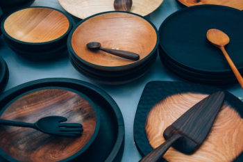 ladles on round brown wooden plate lot ladles on round brown wooden plate lot