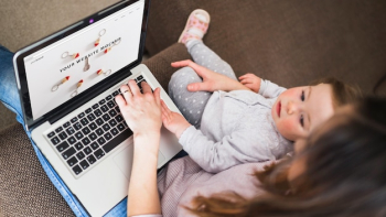 Laptop mockup with mother and daughter