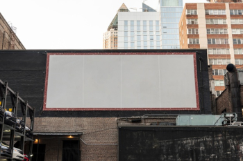 Large mock-up billboard on a building Free Photo