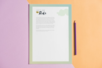 Letterhead mockup next to pen