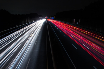 Light Trails on Highway at Night Light Trails on Highway at Night