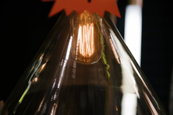 Lightbulb In Glass Lamp