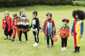 Little children trick or treating on Halloween Little children trick or treating on Halloween