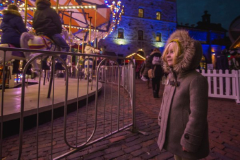 Little Girl Watches Winter Fair Ride Little Girl Watches Winter Fair Ride