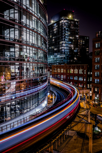Long-Exposure Shot Of Buildings And Train Long-Exposure Shot Of Buildings And Train