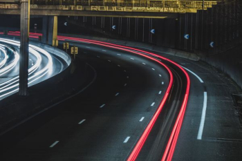 long exposure shot of cars on a road at night long exposure shot of cars on a road at night