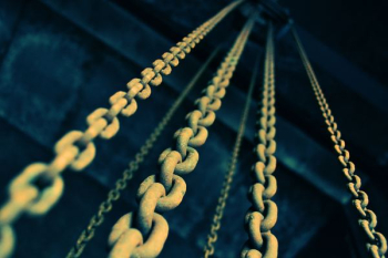 low angle photography of gray metal chains low angle photography of gray metal chains