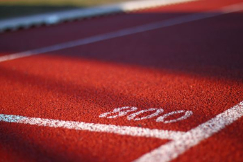low angle photography of track field low angle photography of track field