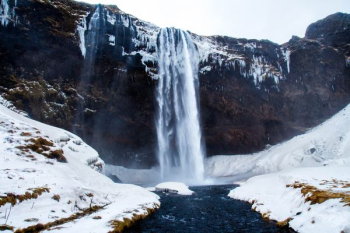 low-angle photography of waterfalls during winter low-angle photography of waterfalls during winter