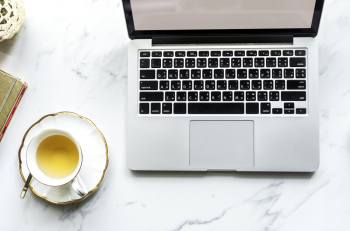 Macbook Pro Beside Teacup Macbook Pro Beside Teacup