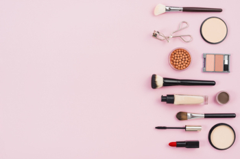 Makeup and cosmetic beauty products on pink background Free Photo