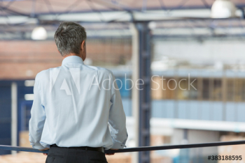 Male manager supervising factory floor Male manager supervising factory floor