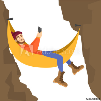 Male mountain climber resting in the hammock Male mountain climber resting in the hammock