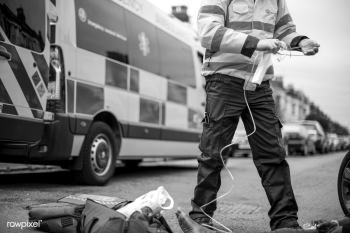 Male paramedic preparing an oxygen mask to an.. | Free stock photo - 515673 Male paramedic preparing an oxygen mask to an.. | Free stock photo - 515673