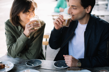 Man and Woman Drinking Coffee Man and Woman Drinking Coffee