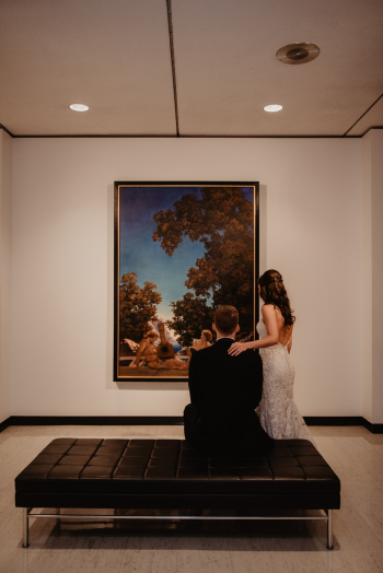 Man And Woman Facing A Painting Man And Woman Facing A Painting