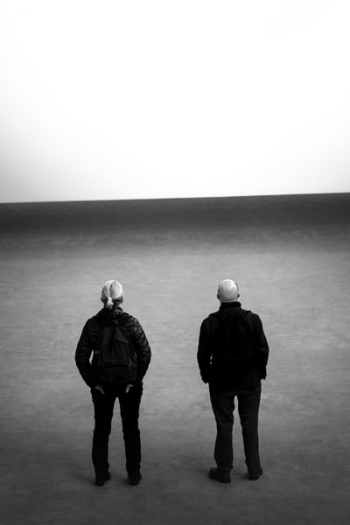 man and woman facing backward photography man and woman facing backward photography