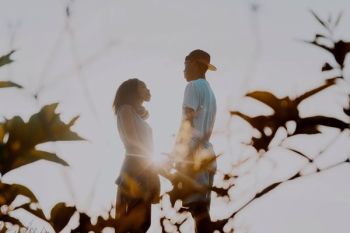man and woman facing each other man and woman facing each other
