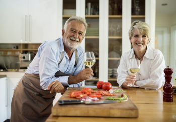 Man and Woman Holding Wine Glasses Man and Woman Holding Wine Glasses