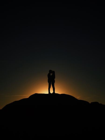 man and woman kissing man and woman kissing