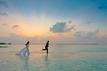 Man and Woman Standing at Seashore Man and Woman Standing at Seashore