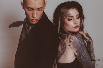 man and woman with tattoos man and woman with tattoos