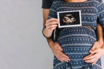 Man and woman with ultrasound