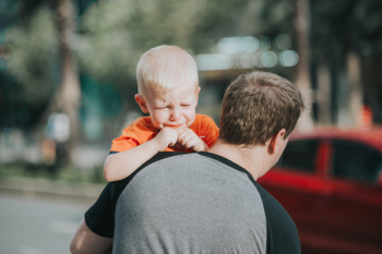 Man Carrying Child Man Carrying Child