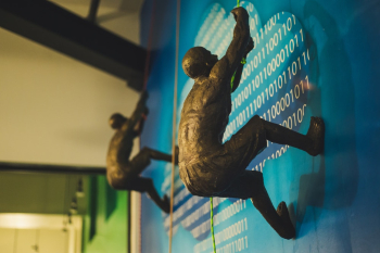 Man Climbing on Wall Man Climbing on Wall