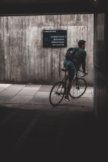 man cycling outdoors