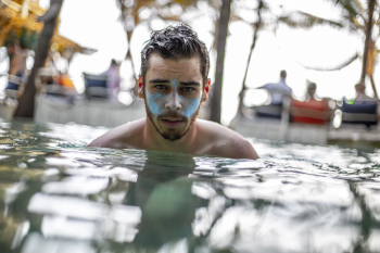 Man Dipped in a Swimming Pool Man Dipped in a Swimming Pool