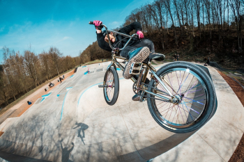 Man Doing Bicycle Tricks