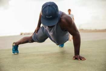 Man Doing One Armed Pushups Man Doing One Armed Pushups