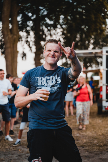 Man Doing Rock and Roll Sign Man Doing Rock and Roll Sign