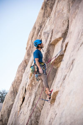 man doing rock climbing at daytime man doing rock climbing at daytime