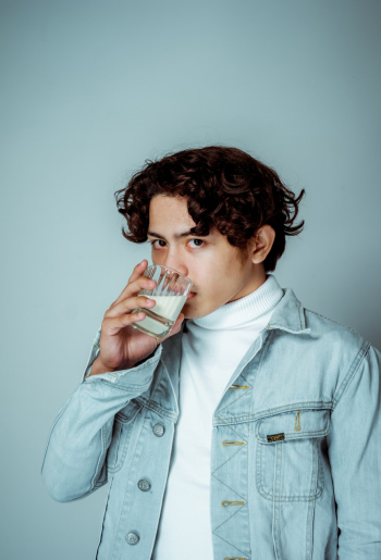 Man Drinking Milk from Glass Man Drinking Milk from Glass