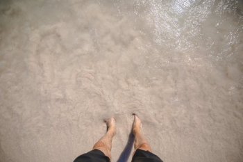 Man Feet In Beach Water Man Feet In Beach Water