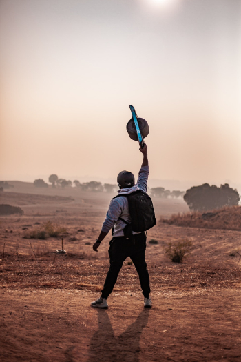 Man Holding Balance Board Man Holding Balance Board