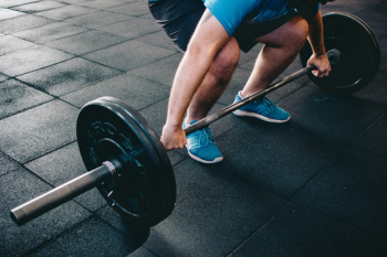 Man Holding Barbell Man Holding Barbell