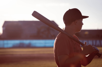 Man Holding Baseball Bat Man Holding Baseball Bat