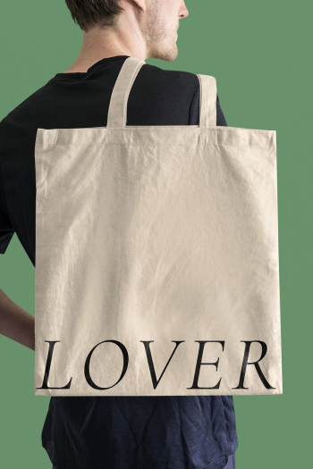 Man holding beige tote bag | Free Photo - rawpixel Man holding beige tote bag | Free Photo - rawpixel