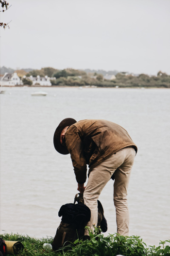 Man Holding Black Bag Man Holding Black Bag