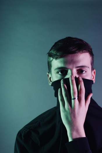 Man Holding Black Mask Man Holding Black Mask