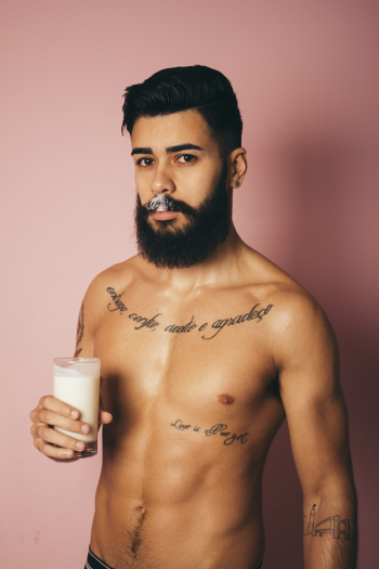 Man Holding Clear Drinking Glass Man Holding Clear Drinking Glass